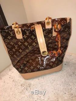 A plastic and leather tote bag, Louis Vuitton Cabas Ambre