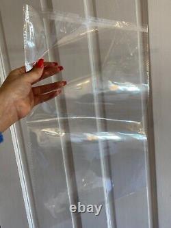 Clear plastic garment bags peel and seal left over packaging. 30 x 40 cm