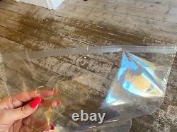 Clear plastic garment bags peel and seal left over packaging. 30 x 40 cm
