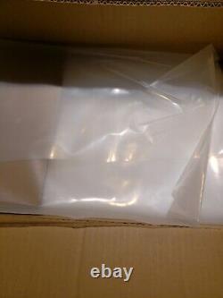 Uline 100 CLEAR FLAT PLASTIC MERCHANDISE BAGS 18''x 24'' / 8 MIL 12x24